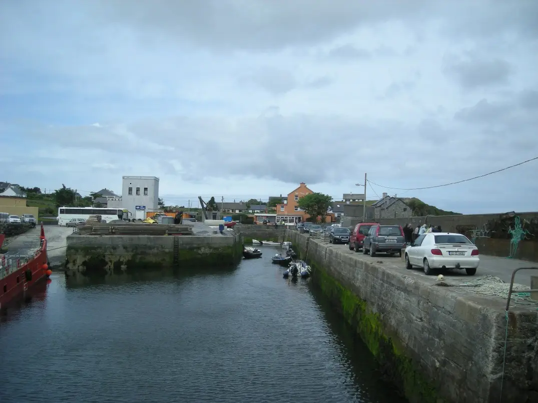 The pier and harbour of Cleggan Village, western Connemara, County Galway, Ireland. Photo taken 26 June…