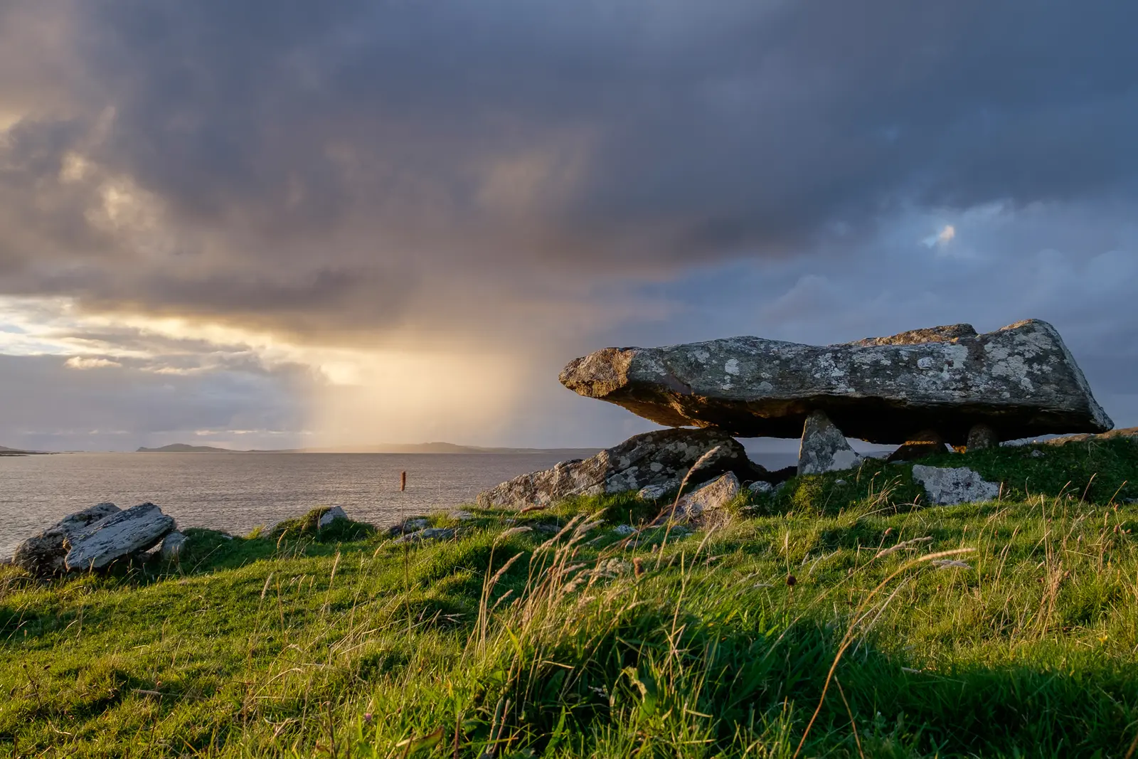 Knockbrack Megalithic Tomb, by Sellerna Beach, Cleggan, Co. Galway. The tomb lines up with the island of…