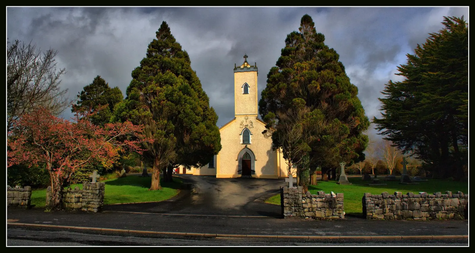 Craughwell, Co. Galway. I like the way this church is tucked in behind the trees.