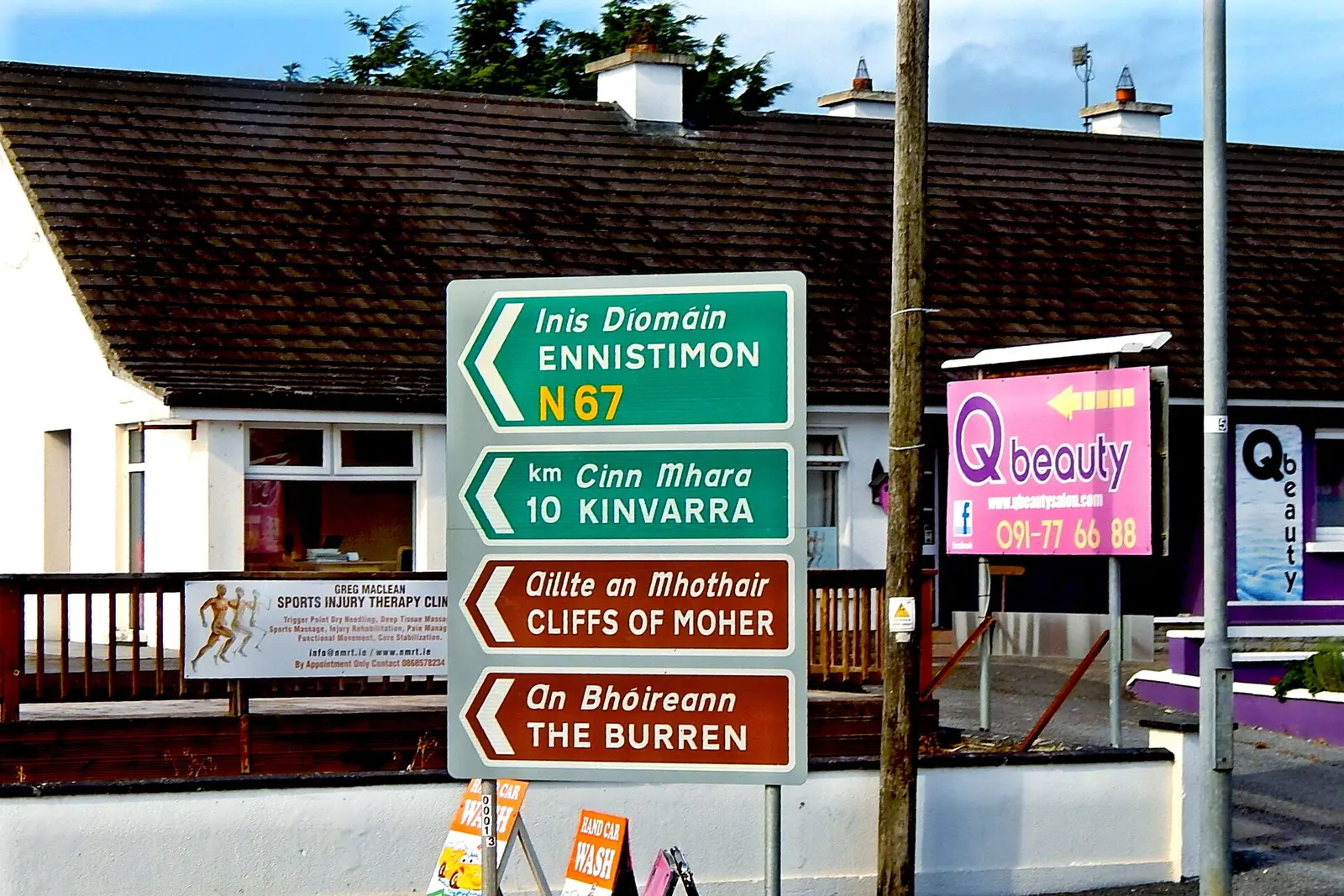 Road Signs in Kilcolgan at junction of N18 & N67 & Qbeauty Salon